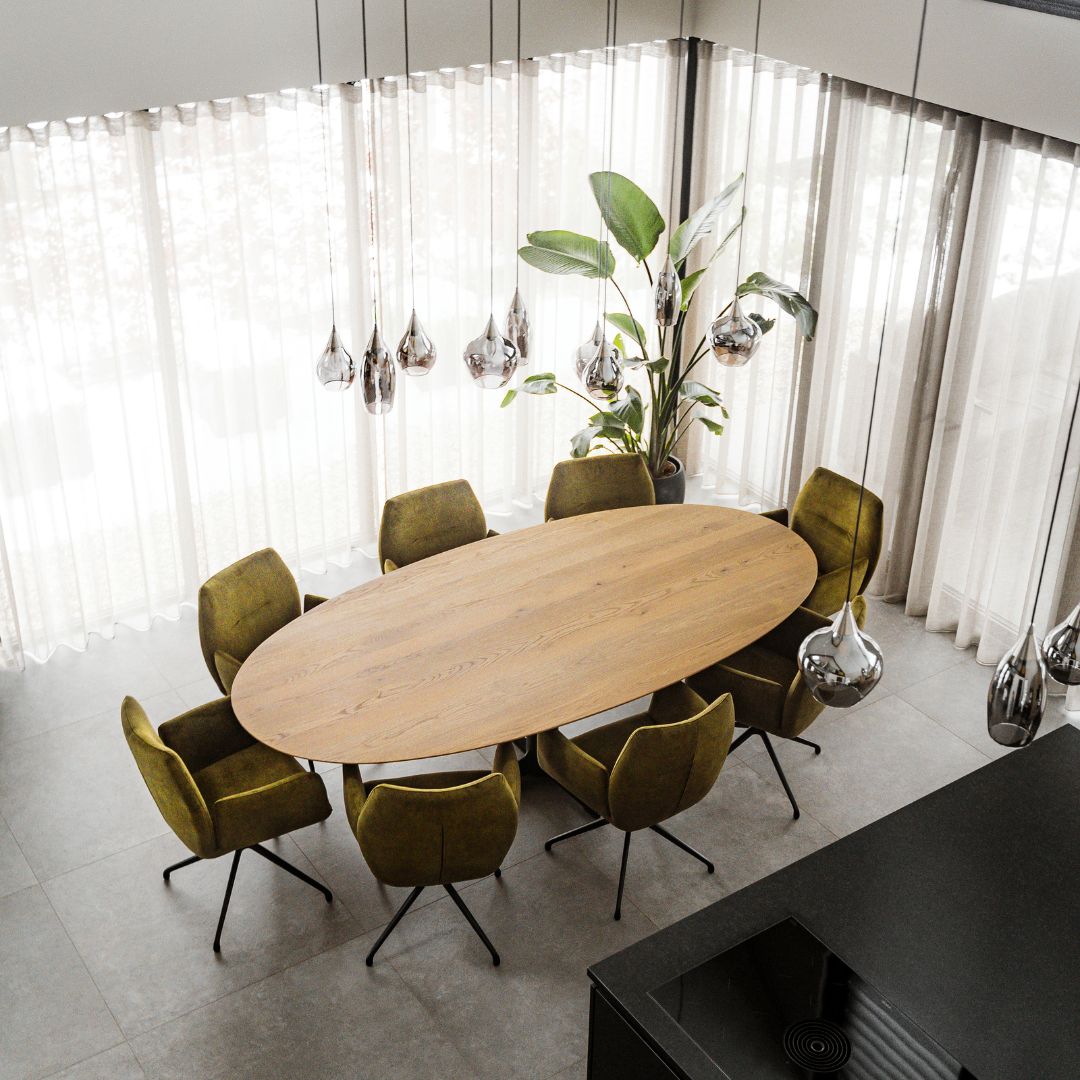 Ovale eettafel met 8 groene stoelen